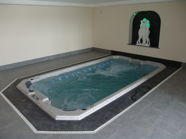 indoor-installation-of-swim-spa-with-lights-and-water-on