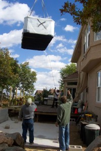 swim_spa_being_lowered_from_crane_medium-200x300 swim_spa_being_lowered_from_crane_medium-200x300